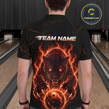 Load image into Gallery viewer, Person wearing a black t-shirt with a fiery panther design and 'TEAM NAME' text in a bowling alley.