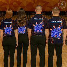 Load image into Gallery viewer, Four people wearing of a black bowling polo shirt with neon blue and orange cartoon bowling ball and pin graphics, plus custom team name text.