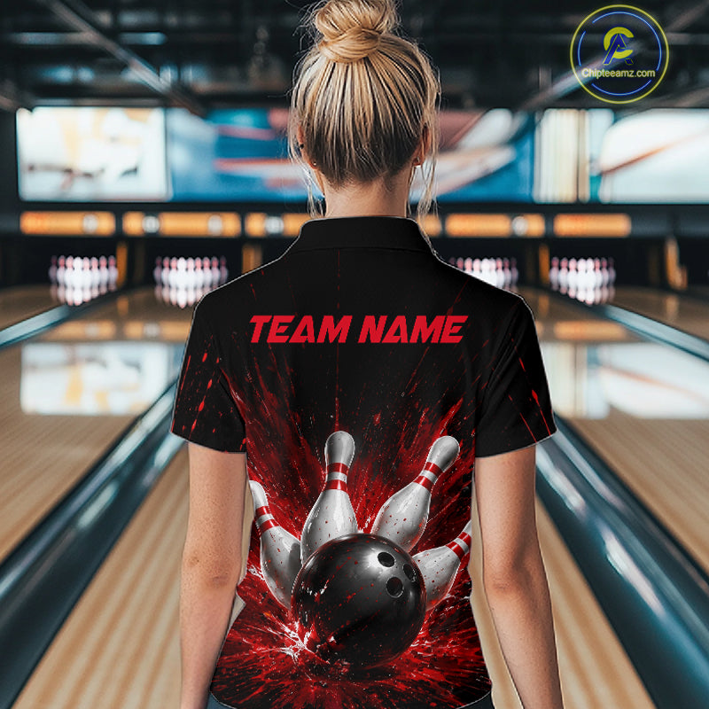 Woman wearing a black bowling polo shirt with dramatic red splatter graphics, a large black bowling ball, and flying pins, plus custom player name text.