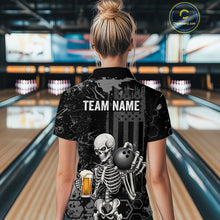 Load image into Gallery viewer, A woman viewed from behind wearing a black short-sleeve bowling-themed polo shirt with a large skeleton graphic holding a bowling ball and a beer glass, plus the text 'TEAM NAME' on the back. Bowling lanes are visible in the background, and a circular 'CustomPolio.