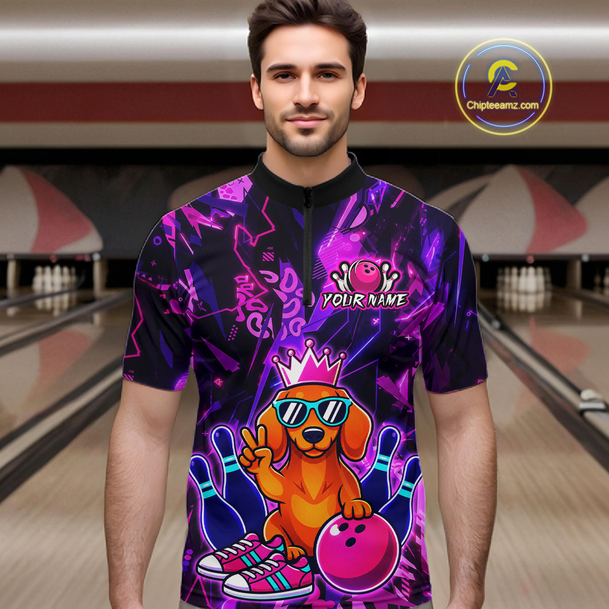 Man wearing a black and purple bowling quarter zip shirt featuring a cartoon dachshund wearing sunglasses and a crown, holding a pink bowling ball, with custom player name text.