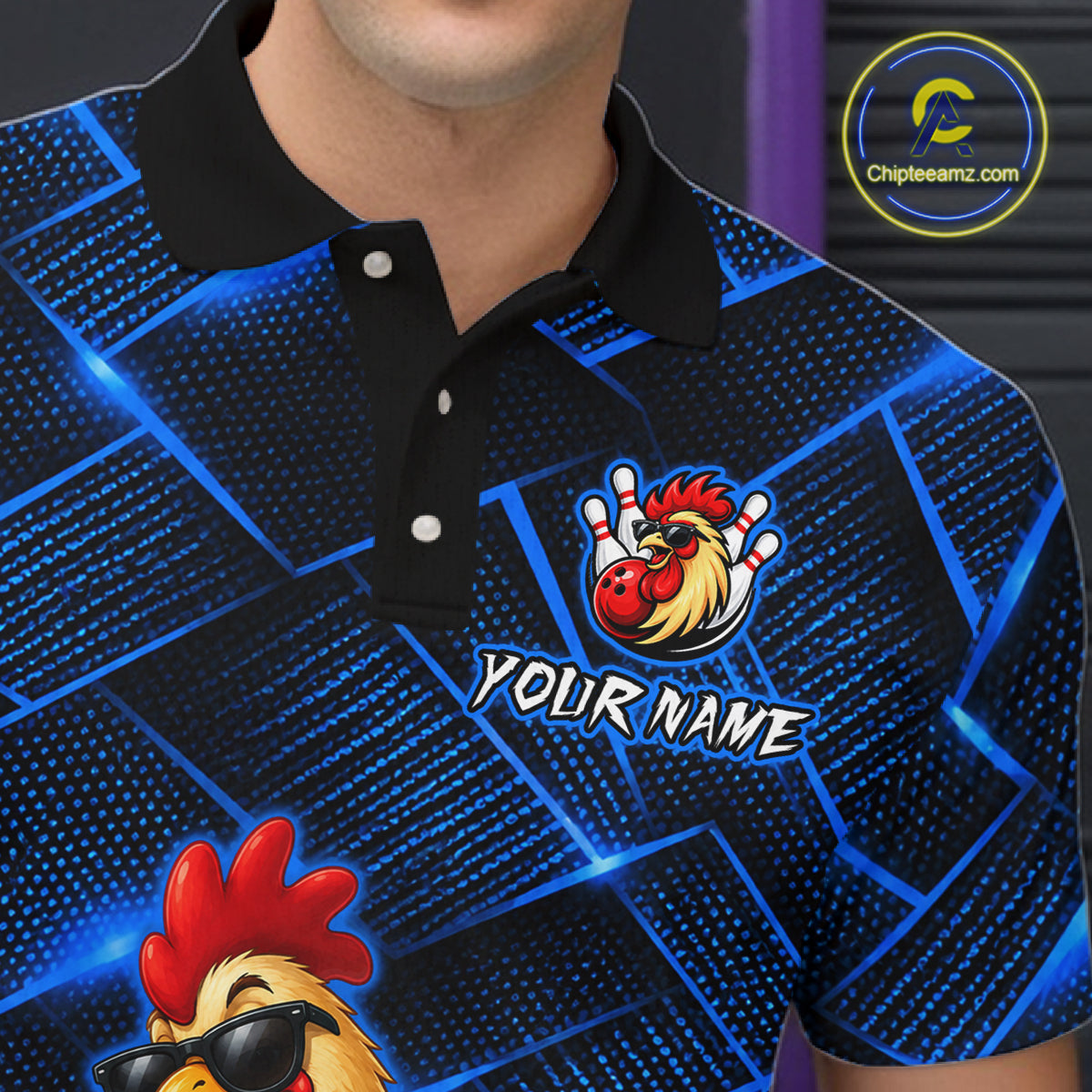 Black polo shirt with a rooster logo and 'Your Name' text on a blue geometric pattern background.
