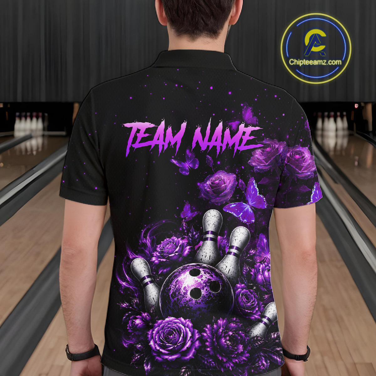 Men’s purple rose butterfly bowling polo shirt, back view on male model in bowling lane 
