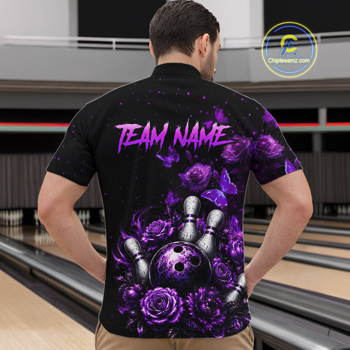 Men’s purple rose butterfly bowling quarter zip shirt, back view on male model in bowling lane 