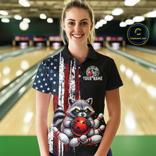 Load image into Gallery viewer, Women’s us flag raccoon bowling polo shirt, front view on female model in bowling lane 