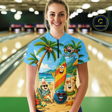 Load image into Gallery viewer, Woman wearing a sky blue bowling polo with a tropical beach scene, smiling bowling ball and pins, colorful surfboard, palm trees, and personalized name 
