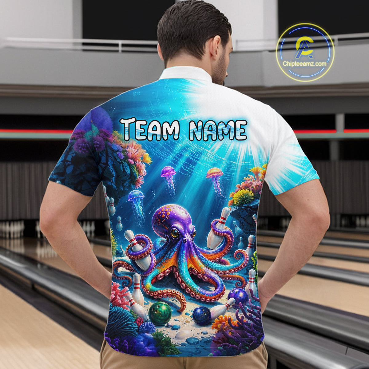 Man wearing a colorful bowling shirt with an octopus design and 'Team Name' text in a bowling alley.
