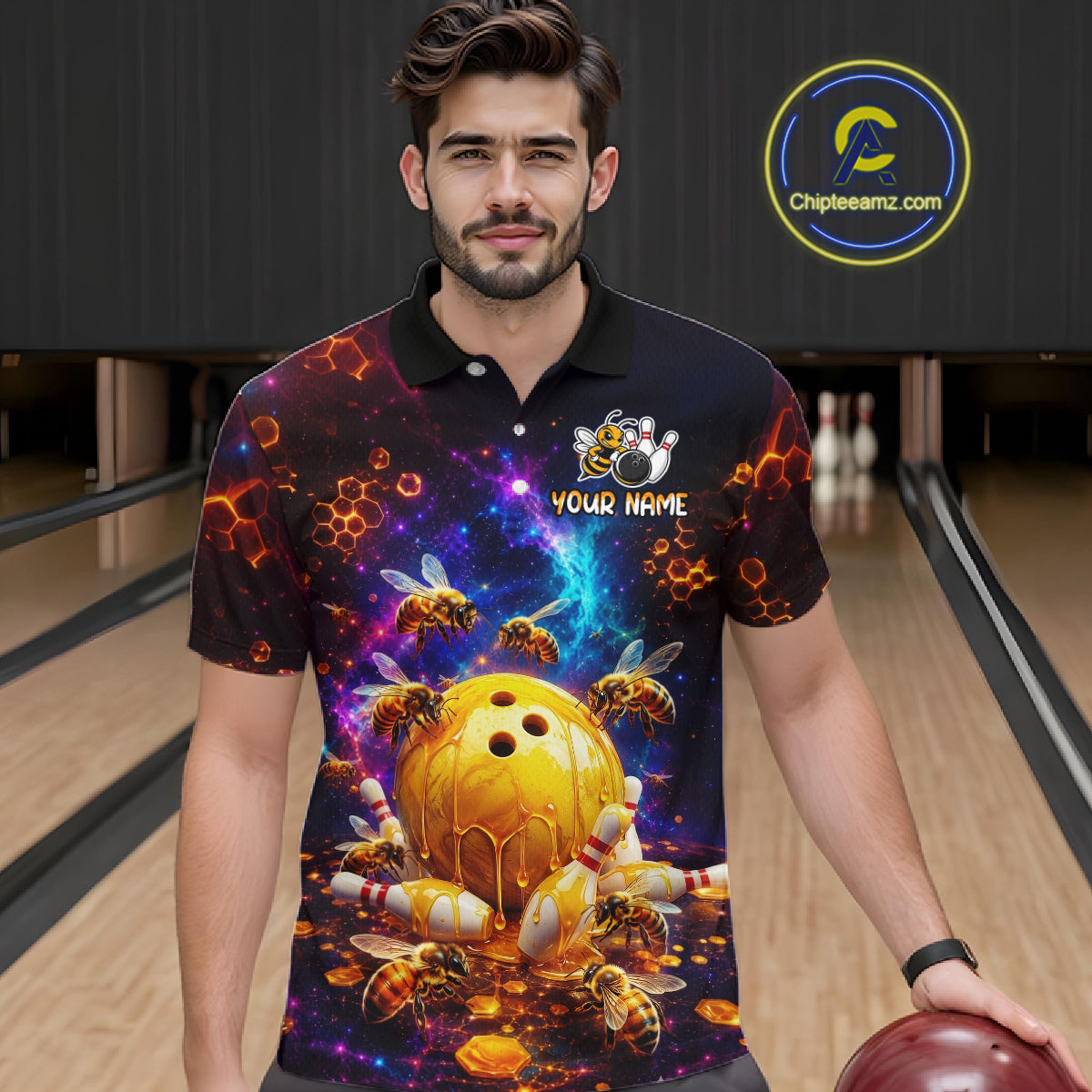 Man wearing a colorful bowling shirt with a design of a bowling ball and bees in a bowling alley.