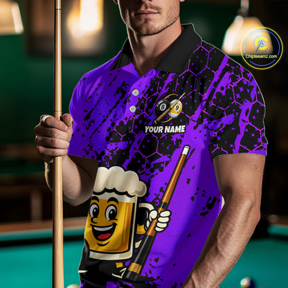 Man wearing a purple funny beer billiard shirt with a pool cue, standing in front of a pool table.