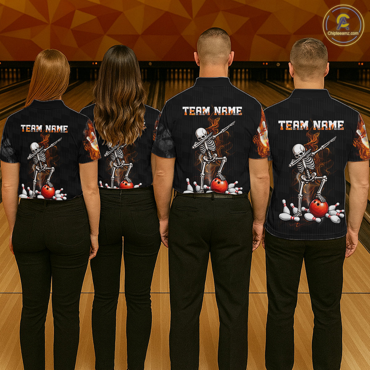 Four people standing from the back in a bowling alley, wearing matching black short-sleeve bowling shirts with a large back graphic of a dancing skeleton bowling with red and white bowling balls. The shirts also have 'TEAM NAME' printed on the upper back.