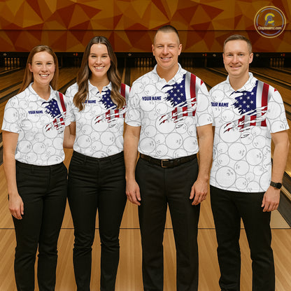 Four people standing together in a bowling alley wearing matching white bowling shirts with a black bowling-ball pattern and an American flag graphic on the chest. The shirts have 'YOUR RANE' printed on them.