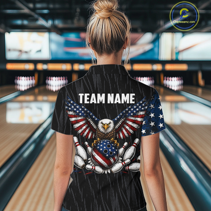 Woman wearing a black patriotic bowling polo shirt featuring distressed American flag graphics, custom team and player name text, and a bald eagle with spread wings above a flag-themed bowling ball and pins.