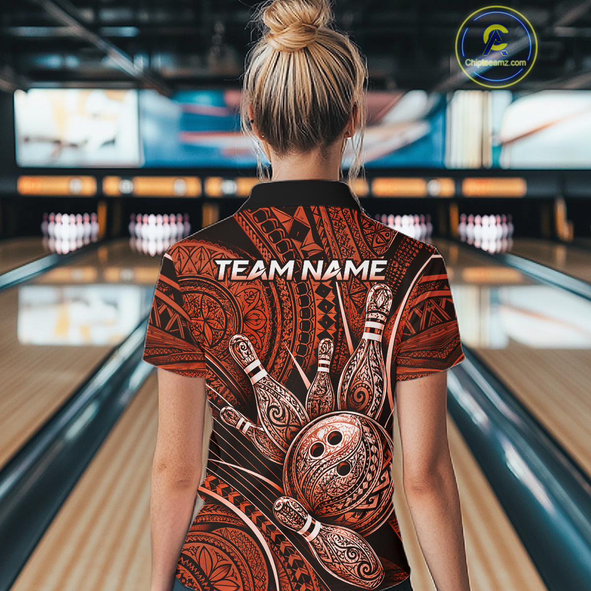 Women wearing personalized bowling quarter zip shirt with bowling balls and pins arranged within orange polynesian tribal patterned artwork across a dark layout.