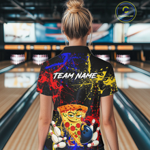 Load image into Gallery viewer, Woman wearing a black bowling polo featuring colorful red, yellow, and blue paint splatter graphics, a cartoon pizza slice mascot, bowling pins, and custom team name text.
