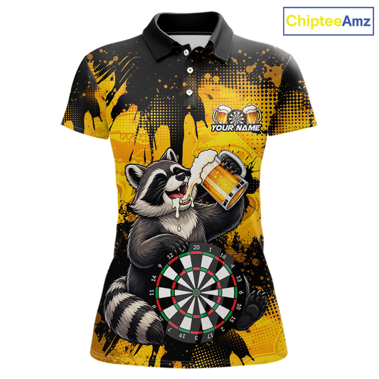 Front views of a black and yellow darts polo featuring a raccoon drinking beer, dartboard graphics, and custom team and player name text.