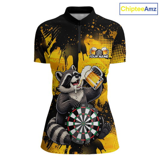 Front views of a black and yellow darts quarter zip featuring a raccoon drinking beer, dartboard graphics, and custom team and player name text.