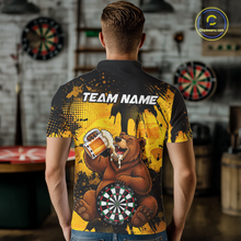 Load image into Gallery viewer, Man wearing a black and yellow darts polo featuring a bear drinking beer, dartboard graphics, and custom team and player name text.