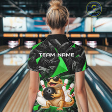 Load image into Gallery viewer, Women’s green bearded dragon bowling quarter zip shirt, front view on female model in bowling lane 
