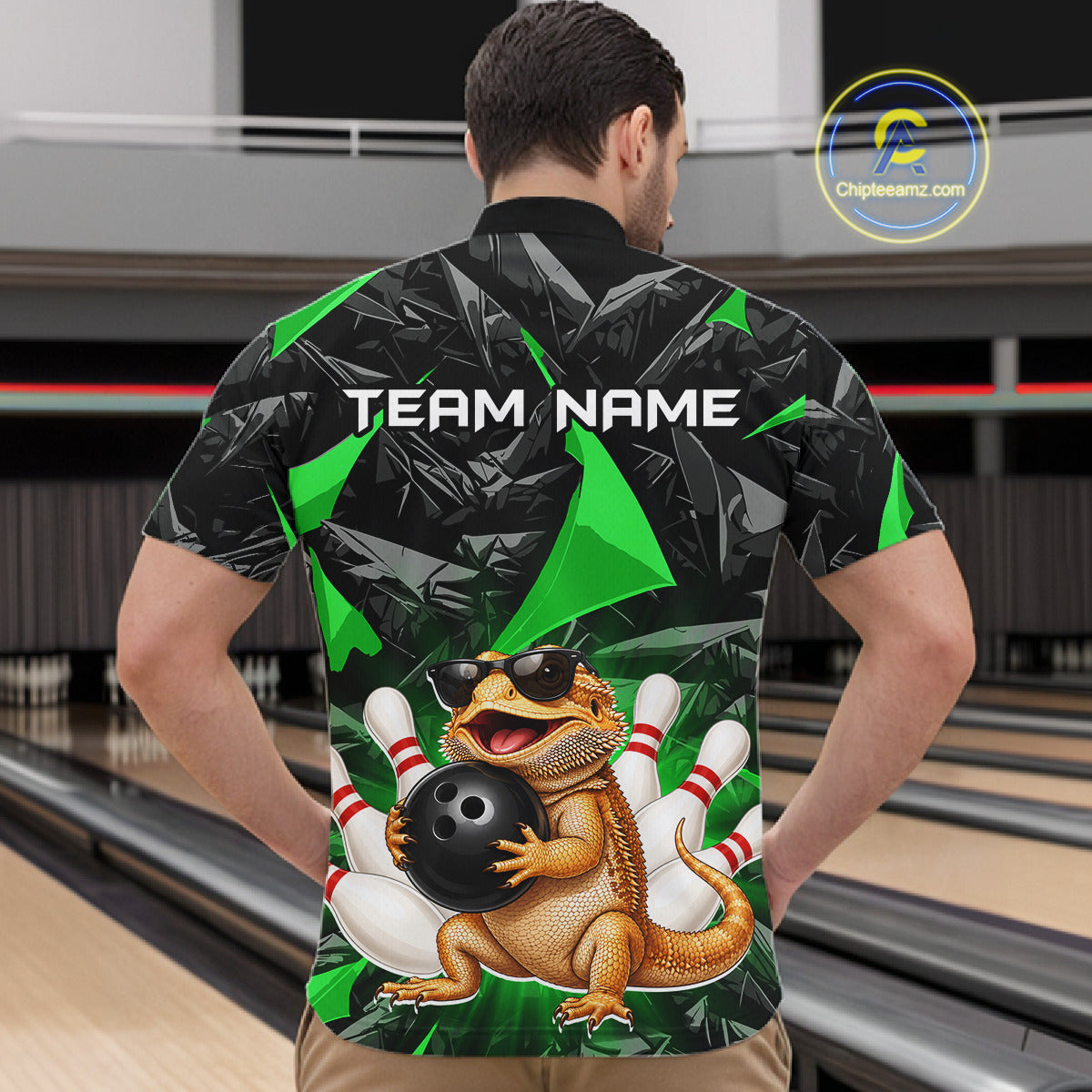 Men’s green bearded dragon bowling quarter zip shirt, back view on male model in bowling lane 