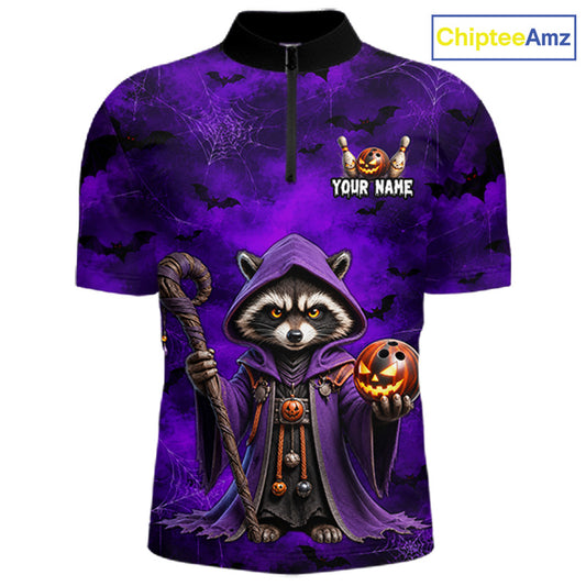 A short-sleeve half-zip polo shirt with a Halloween-themed raccoon graphic on a purple spiderweb background. The shirt features a black collar, a purple hooded raccoon holding a staff and jack-o'-lantern, and customizable text reading 'YOUR NAME' with a ghost icon on the left chest.