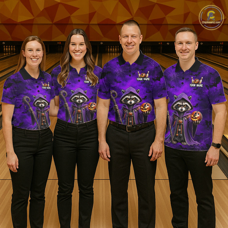Four people standing in a bowling alley wearing matching purple and black Halloween-themed polo shirts with a raccoon in a hood holding a jack-o'-lantern, paired with black pants.