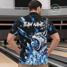 Load image into Gallery viewer, Person wearing a black t-shirt with a blue wolf design and 'TEAM NAME' text in a bowling alley.