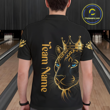 Load image into Gallery viewer, Person wearing a black t-shirt with a gold leopard design and 'Team Name' text in a bowling alley.