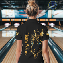 Load image into Gallery viewer, Person wearing a black shirt with a leopard design and 'Team Name' text in a bowling alley.