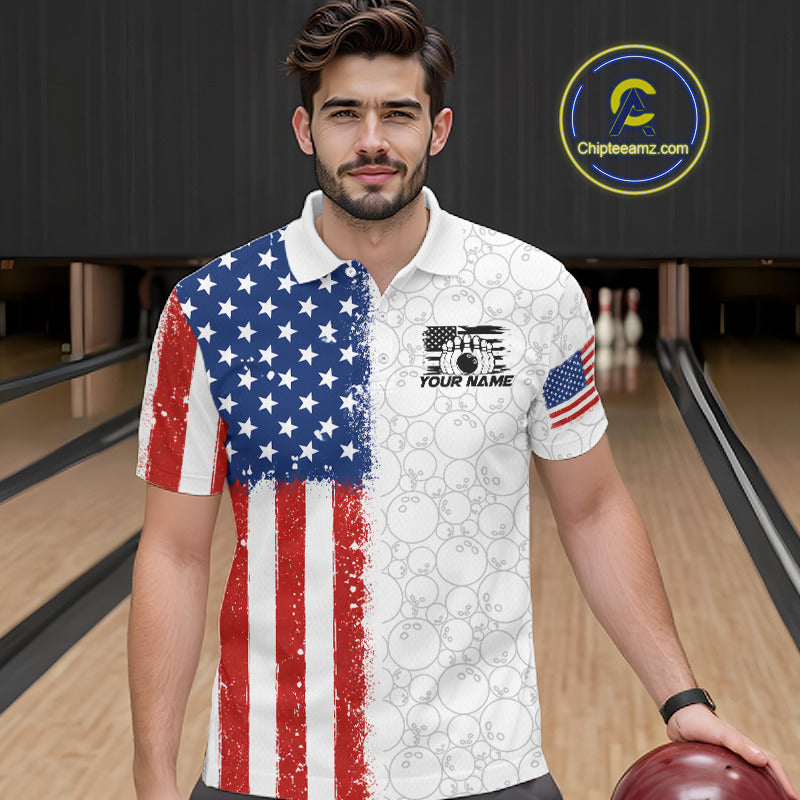 A man wearing a custom short-sleeve polo shirt with a split American flag design, standing in a bowling alley. The left side of the shirt features a distressed red, white, and blue American flag pattern, while the right side is white with a bowling pattern.