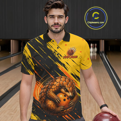 A man wearing a yellow and black bowling-themed graphic polo shirt with a pangolin and bowling ball design, standing in a bowling alley. A circular 'ChipteeAmz'