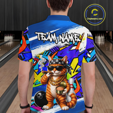 Load image into Gallery viewer, Man wearing a colorful bowling shirt with a cat design in a bowling alley.