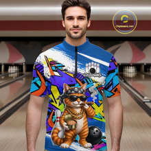 Load image into Gallery viewer, Man wearing a colorful bowling quarter zip shirt with a cat design in a bowling alley.
