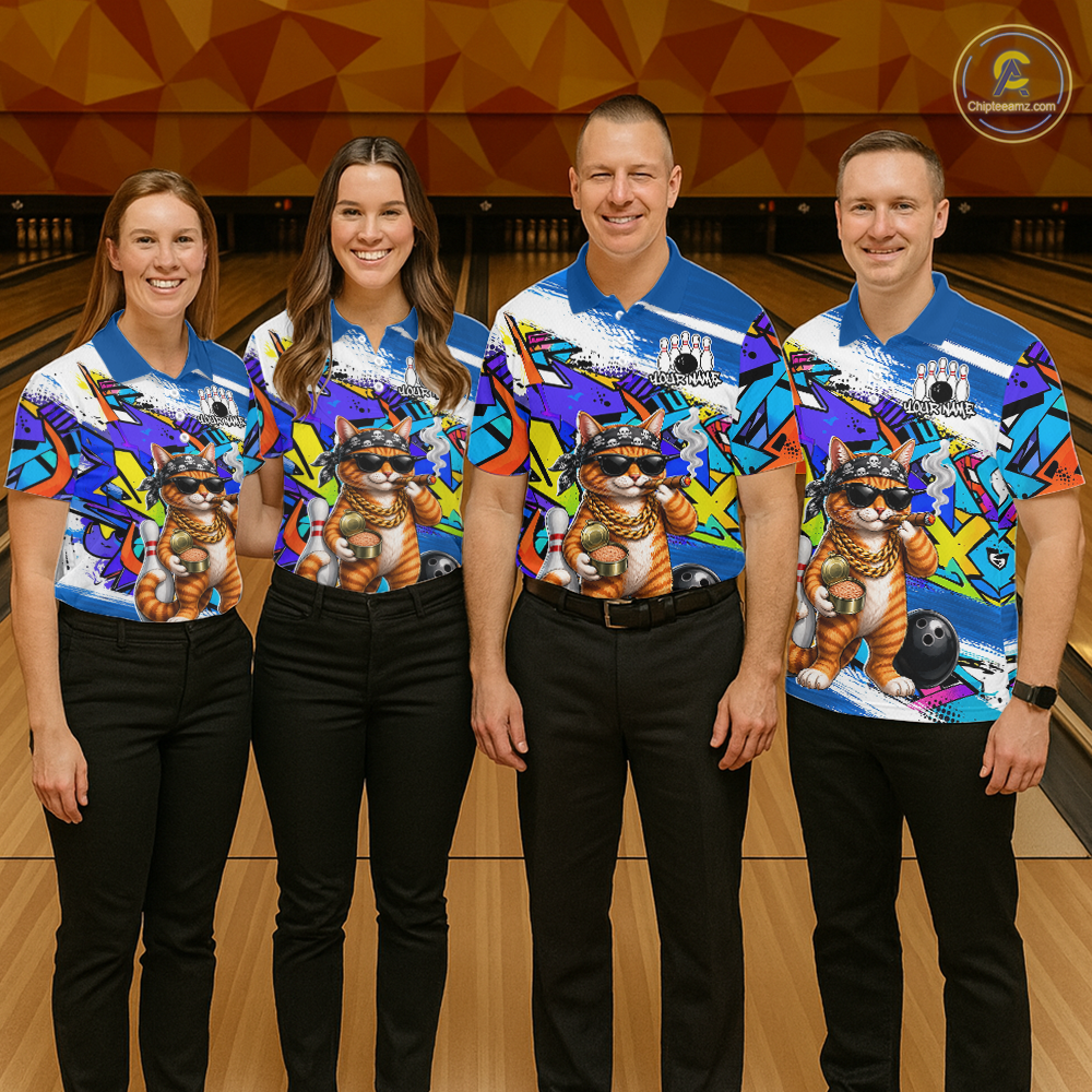 Four people wearing colorful bowling shirts with a cat design on a bowling alley.