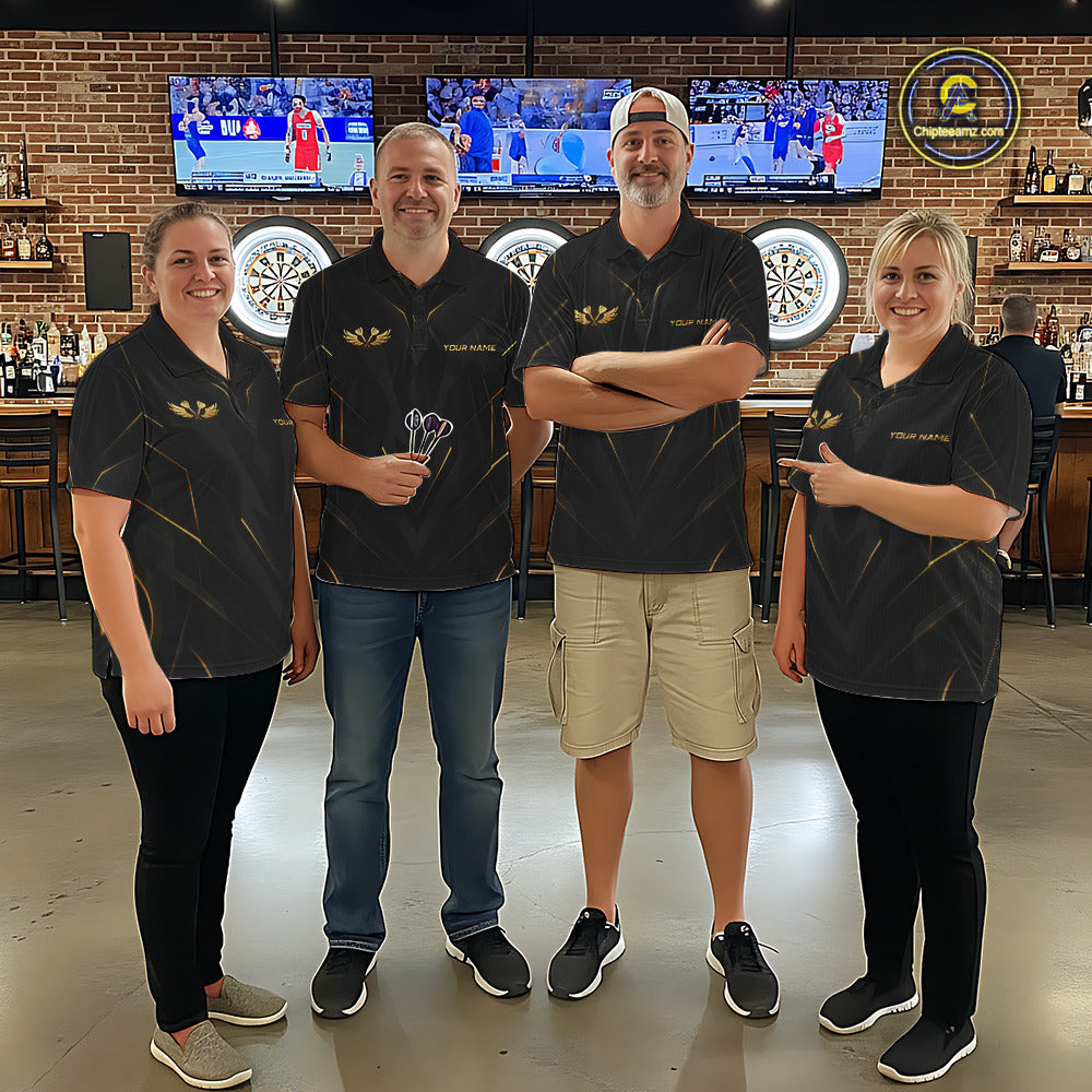 Four people in matching polos standing in a bar with dartboards and televisions in the background.
