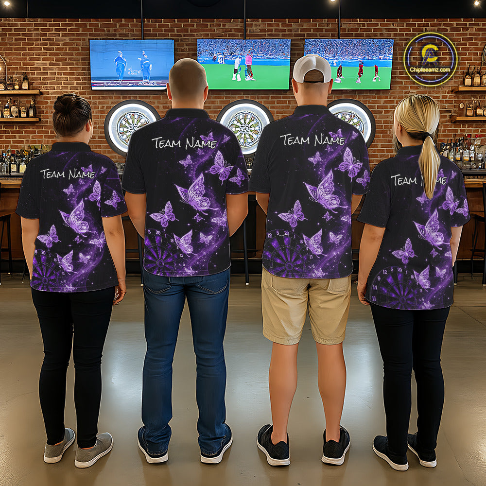 Four people standing with their backs to the camera in a bar, wearing matching black short-sleeve shirts with a purple butterfly and flame pattern and 'Team Name' printed across the upper back.