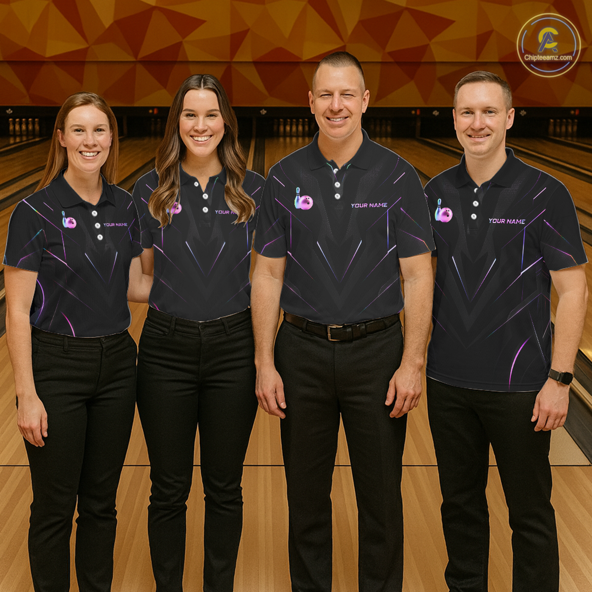Four people in matching bowling alley uniforms standing on a bowling lane.