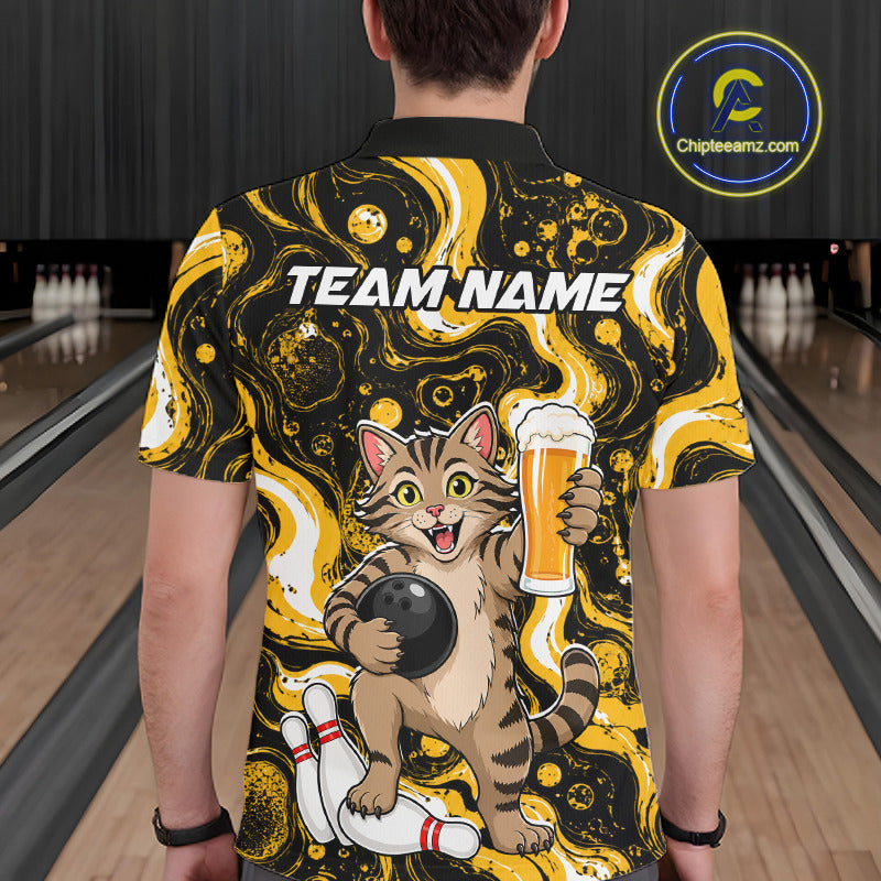 A man viewed from behind wearing a custom short-sleeve bowling-themed polo shirt. The shirt features a black and yellow marbled background with a cartoon tabby cat holding a bowling ball and a beer glass, with 'TEAM NAME' printed across the upper back.