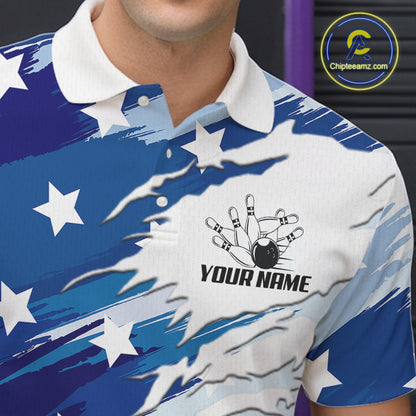 A close-up of a person wearing a short-sleeve polo shirt with a blue and white abstract flag-inspired print, featuring white stars, a bowling pin graphic, and the text 'YOUR NAME' on the chest.