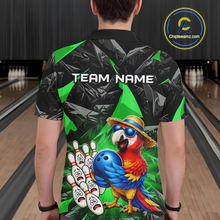 Load image into Gallery viewer, Person wearing a colorful bowling shirt with a parrot design on a bowling alley.