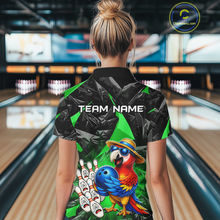 Load image into Gallery viewer, Person wearing a colorful bowling shirt with a parrot design in a bowling alley.