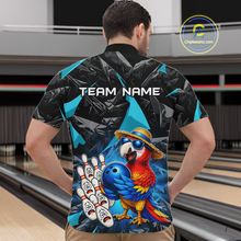 Load image into Gallery viewer, Man wearing a colorful bowling shirt with a parrot design in a bowling alley.