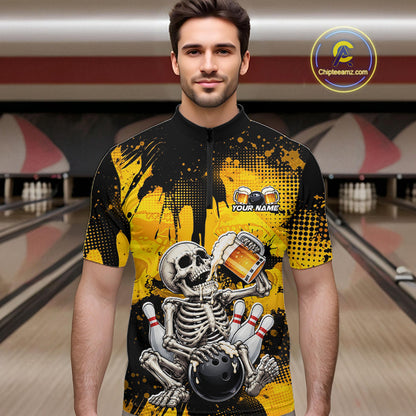 A man wearing a short-sleeve black and yellow bowling-themed graphic t-shirt with a skeleton holding a beer mug and bowling balls, set against a bowling alley background.