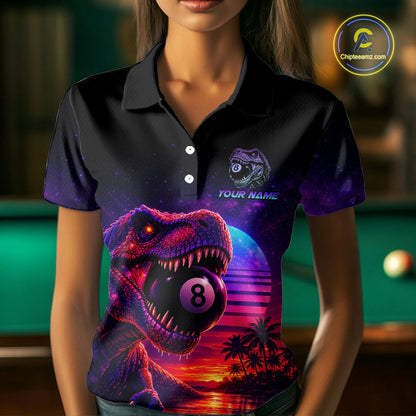 Person wearing a black polo shirt with a dinosaur and pool ball design, set against a blurred pool table background.