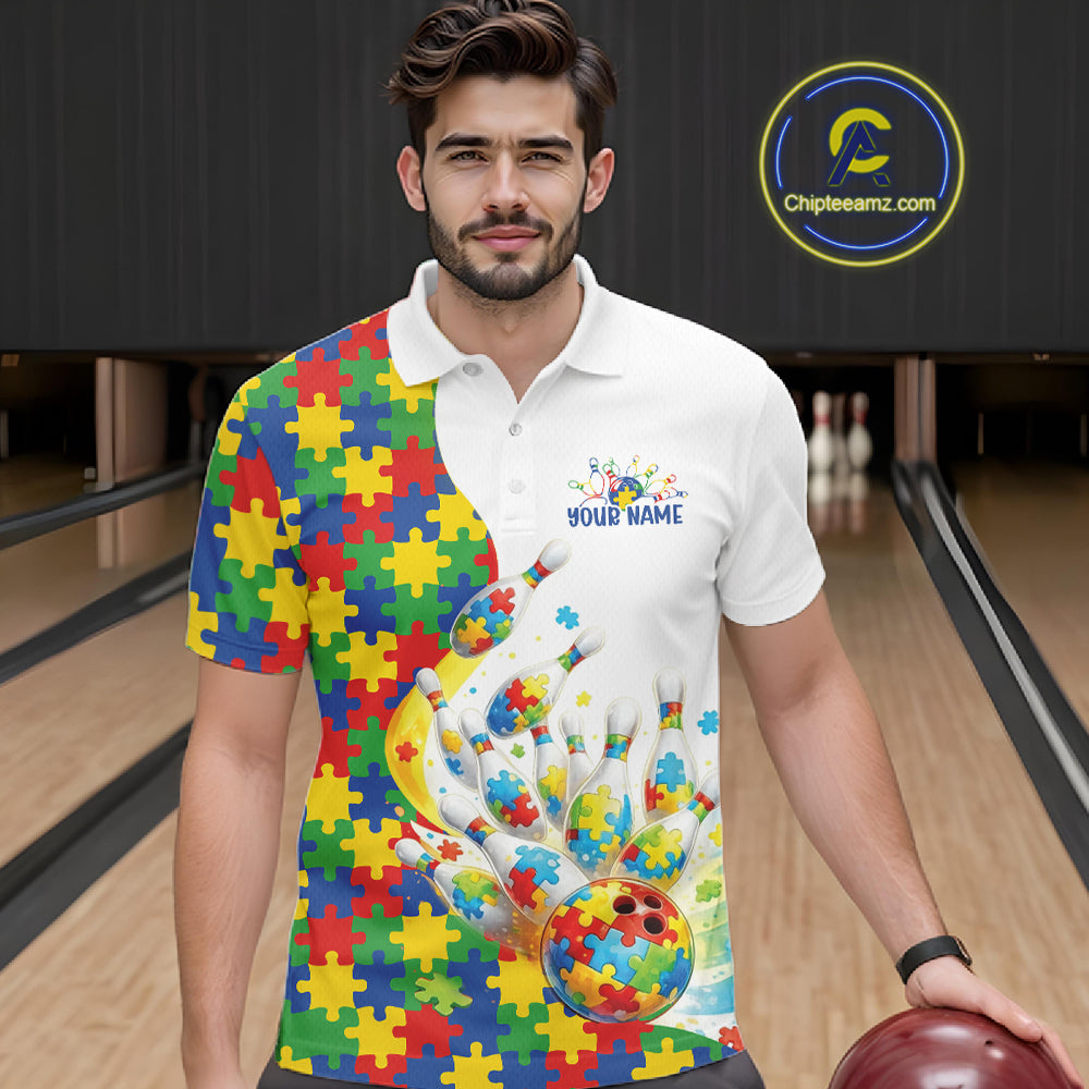 Male model in a bowling lane wearing a white polo shirt, front view featuring colorful autism bowling strike design with puzzle details
