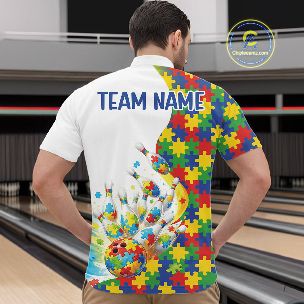 At Bowling Venue, Front View Male Model In Quarter-Zip Bowling Shirt Featuring Autism-Themed Bowling Strike Artwork And Multicolor Puzzle Design