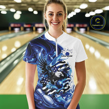 Load image into Gallery viewer, Front view of a female model at the bowling lane wearing a white and blue quarter zip shirt with eagle artwork and flowing flag inspired graphics.