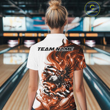 Load image into Gallery viewer, Female model back view at the bowling lane wearing a white and orange quarter zip shirt with eagle graphics and flag inspired artwork.