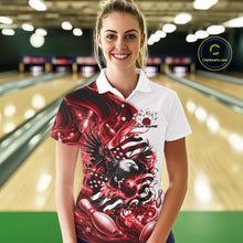 Load image into Gallery viewer, Female model front view in a bowling lane wearing a white and red polo shirt with eagle artwork, bowling elements, and flowing flag inspired graphics.