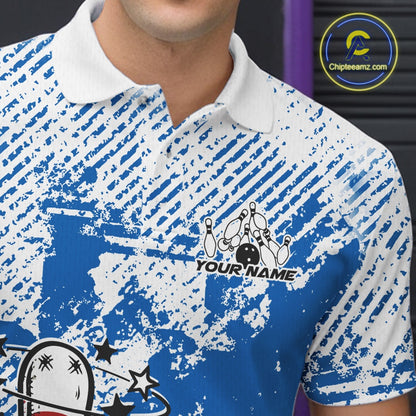 Close-up view of left chest area of a blue and white polo shirt, showing detailed small drunk bowling pin graphic holding beer bottle and bowling ball.