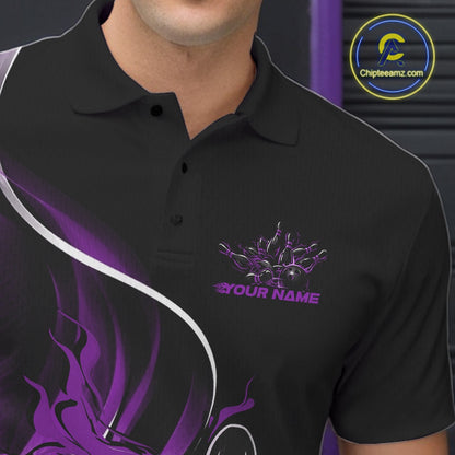 Close-up view of the left chest area of a black and purple bowling polo shirt showing a flame bowling ball and pins design detail.